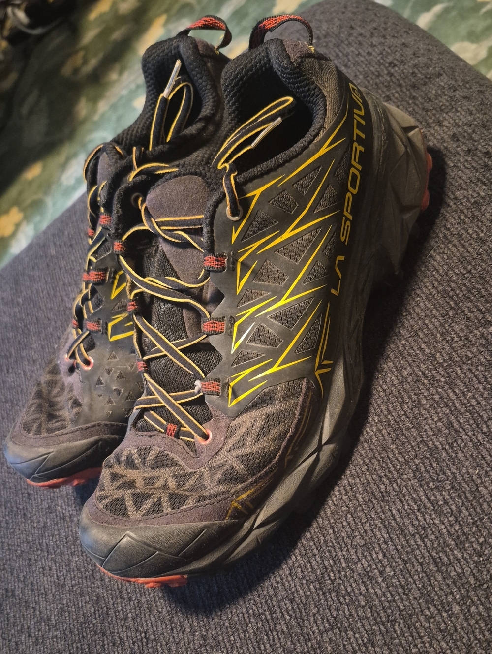 La Sportiva Black Trail Shoes with Yellow and Red Accents